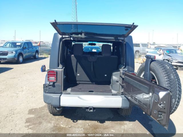 1C4AJWBG7EL229618 Jeep Wrangler Sahara