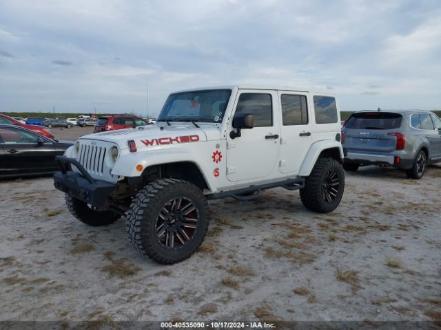 1C4BJWEG1EL231106 Jeep Wrangler Unlimited Sahara