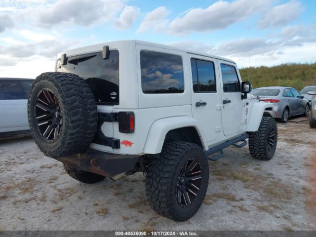 1C4BJWEG1EL231106 Jeep Wrangler Unlimited Sahara