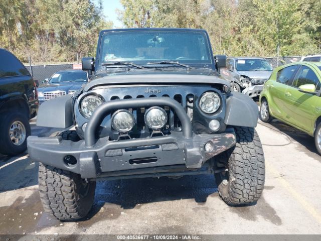 1C4BJWDG7EL300320 Jeep Wrangler Unlimited Sport