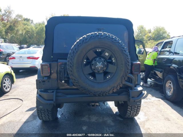1C4BJWDG7EL300320 Jeep Wrangler Unlimited Sport