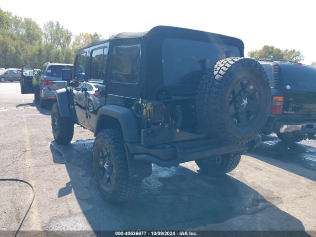 1C4BJWDG7EL300320 Jeep Wrangler Unlimited Sport
