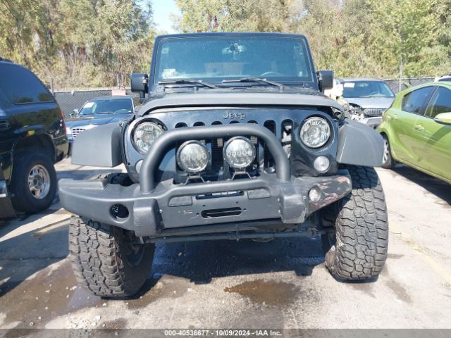 1C4BJWDG7EL300320 Jeep Wrangler Unlimited Sport