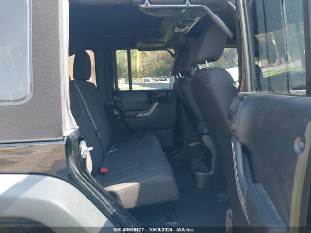 1C4BJWDG7EL300320 Jeep Wrangler Unlimited Sport