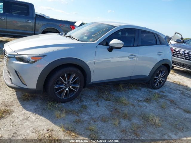 JM1DKDC70J0328063 Mazda Cx-3 Touring