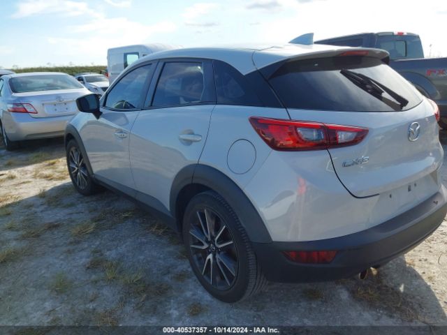 JM1DKDC70J0328063 Mazda Cx-3 Touring