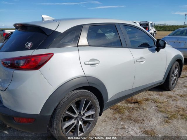 JM1DKDC70J0328063 Mazda Cx-3 Touring