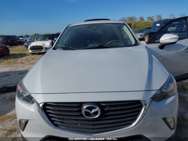 JM1DKDC70J0328063 Mazda Cx-3 Touring