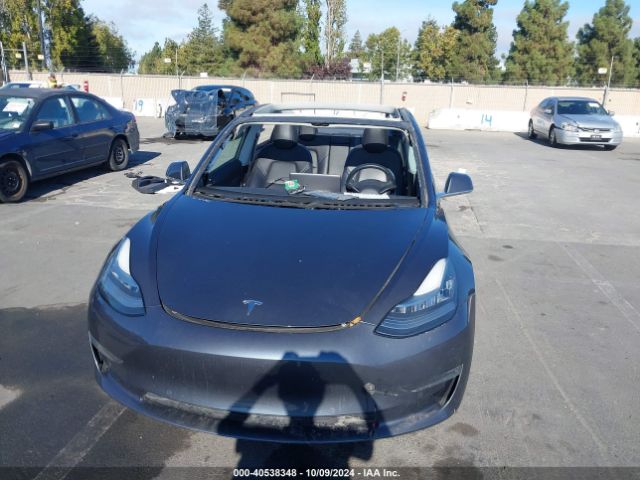 5YJ3E1EA7JF033831 Tesla Model 3 Long Range/mid Range