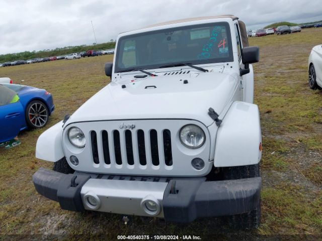 1C4AJWBG3EL103045 Jeep Wrangler Sahara