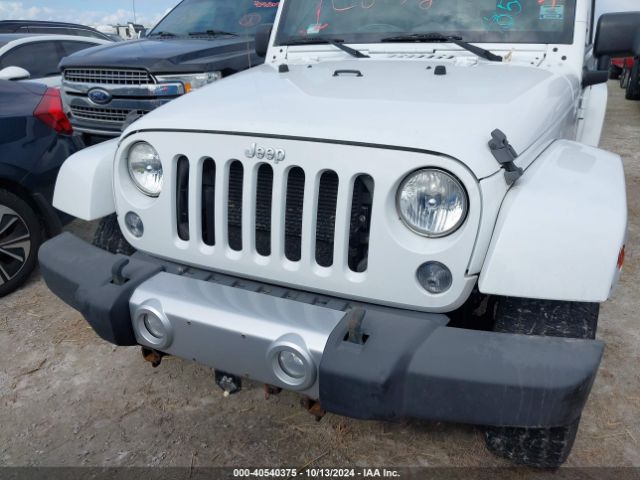 1C4AJWBG3EL103045 Jeep Wrangler Sahara