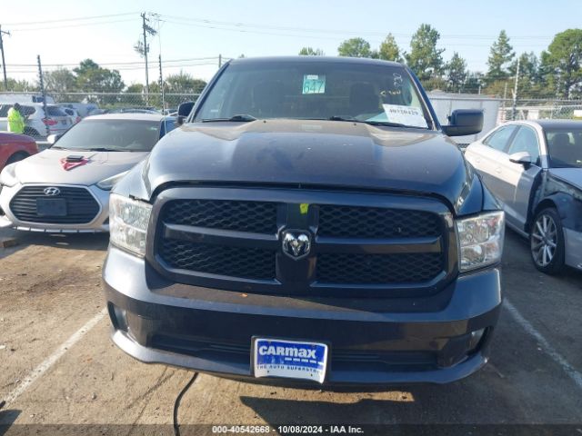 1C6RR6FG0KS528592 RAM 1500 Classic Express Quad Cab 4x2 6'4 Box