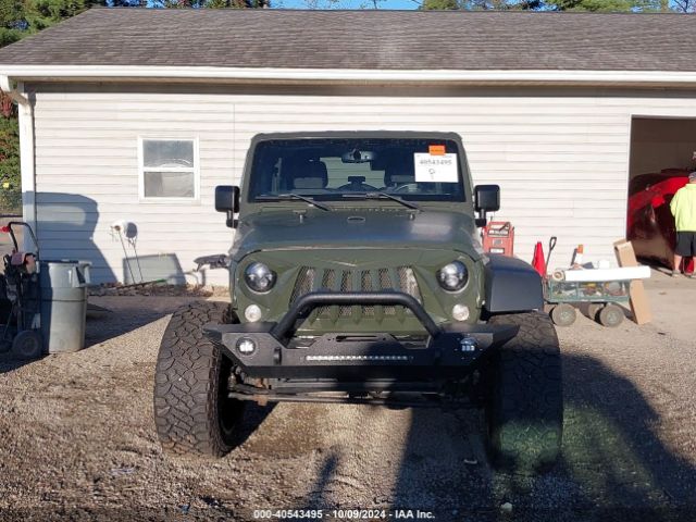 1C4BJWDGXGL118811 Jeep Wrangler Unlimited Willys Wheeler