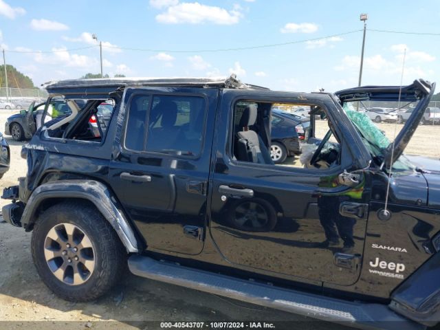 1C4HJXEN5JW249258 Jeep Wrangler Unlimited Sahara 4x4