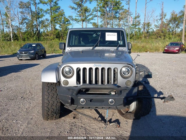 1C4BJWDG0FL586657 Jeep Wrangler Unlimited Freedom Edition