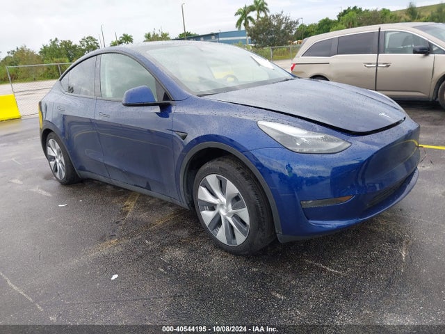 2024 TESLA MODEL Y 7SAYGDED3RF005437 Photo 0