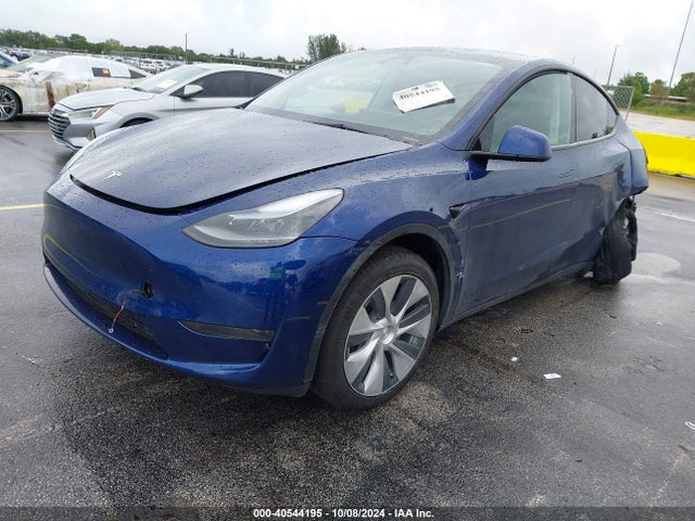2024 TESLA MODEL Y 7SAYGDED3RF005437 Photo 1