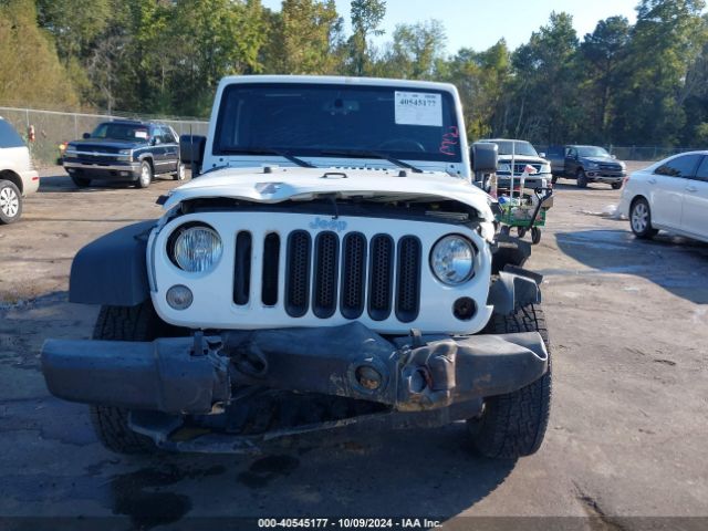 1C4HJWDG3GL323767 Jeep Wrangler Unlimited Sport