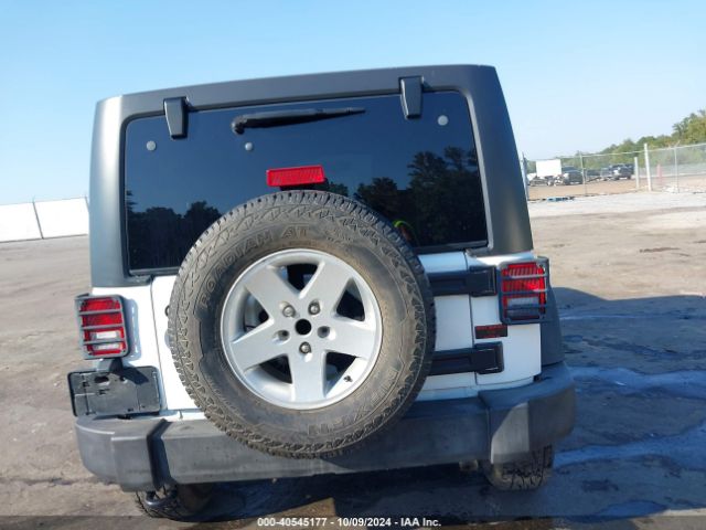 1C4HJWDG3GL323767 Jeep Wrangler Unlimited Sport