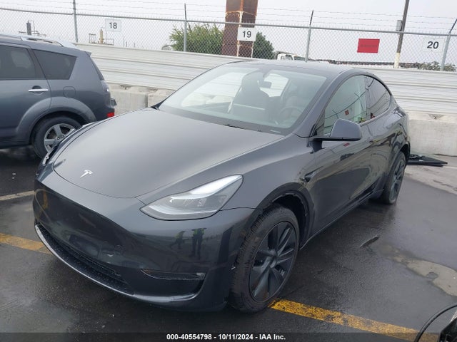2024 TESLA MODEL Y 7SAYGDEEXRF180731 Photo 1
