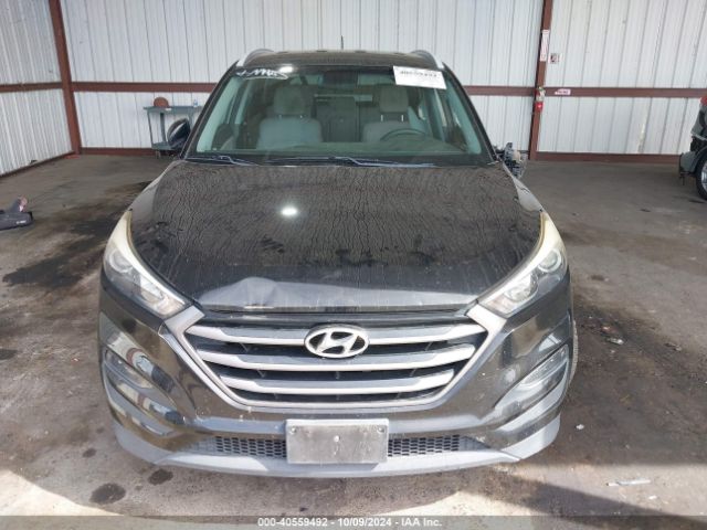 KM8J33A41GU133296 Hyundai TUCSON SE