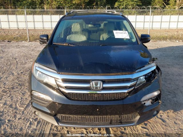 5FNYF5H94GB037310 Honda Pilot Touring