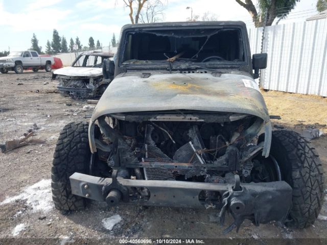 1C4HJWEG5GL246978 Jeep Wrangler Unlimited Sahara