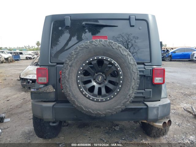 1C4HJWEG5GL246978 Jeep Wrangler Unlimited Sahara