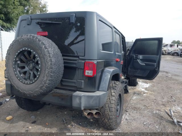 1C4HJWEG5GL246978 Jeep Wrangler Unlimited Sahara