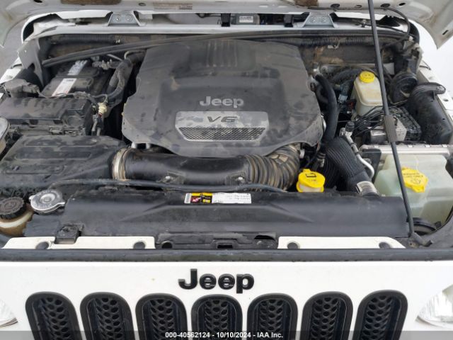 1C4BJWEG4EL322869 Jeep Wrangler Unlimited Sahara
