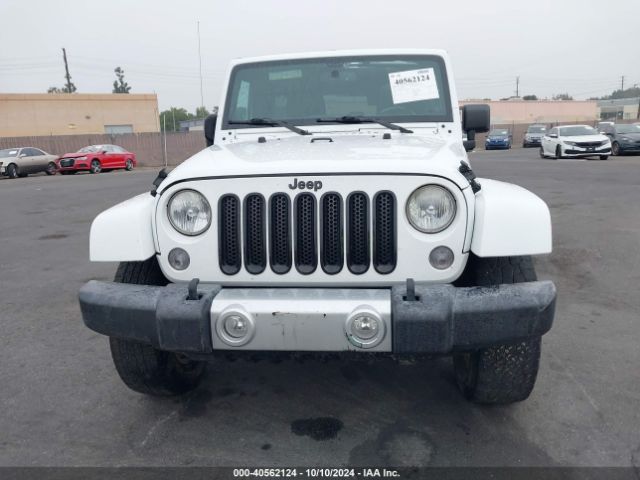 1C4BJWEG4EL322869 Jeep Wrangler Unlimited Sahara