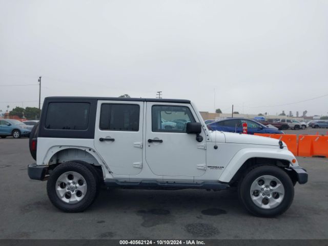 1C4BJWEG4EL322869 Jeep Wrangler Unlimited Sahara