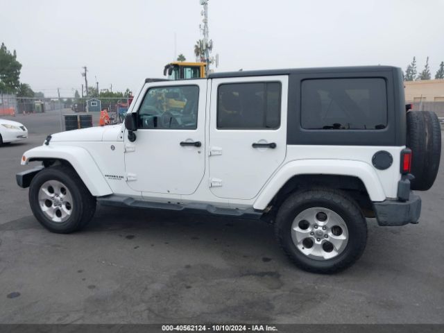 1C4BJWEG4EL322869 Jeep Wrangler Unlimited Sahara