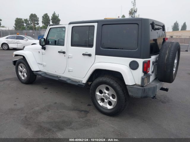 1C4BJWEG4EL322869 Jeep Wrangler Unlimited Sahara
