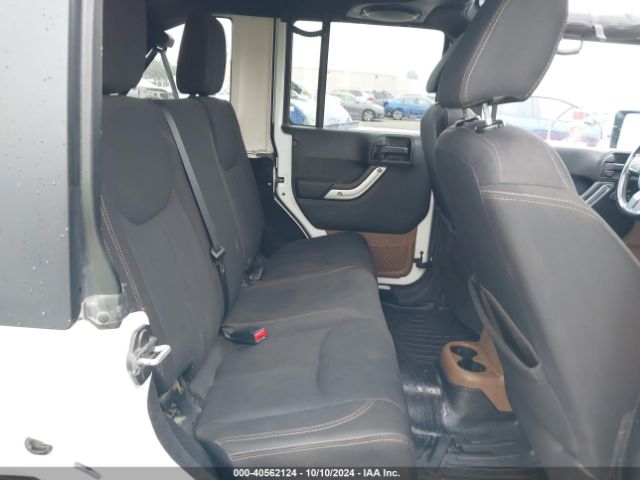 1C4BJWEG4EL322869 Jeep Wrangler Unlimited Sahara