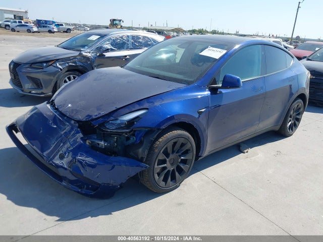 2024 TESLA MODEL Y 7SAYGDEE9RA318773 Photo 1