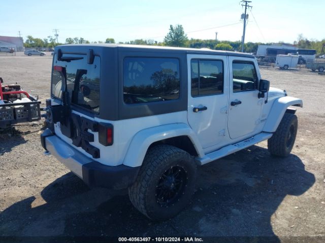 1C4HJWEG0EL117110 Jeep Wrangler Unlimited Sahara