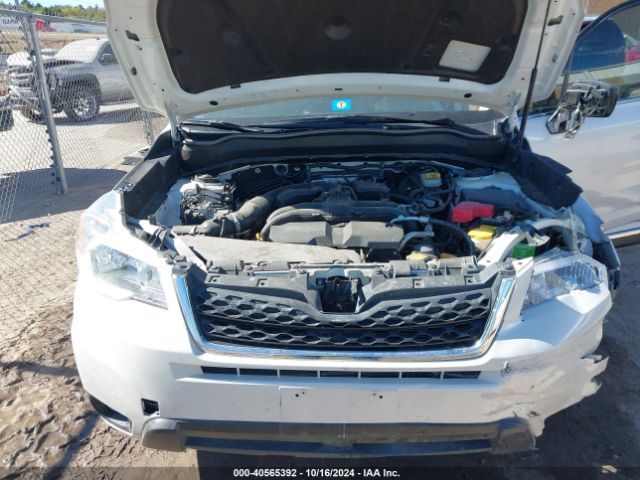 JF2SJAWC4FH817867 Subaru Forester 2.5i Touring