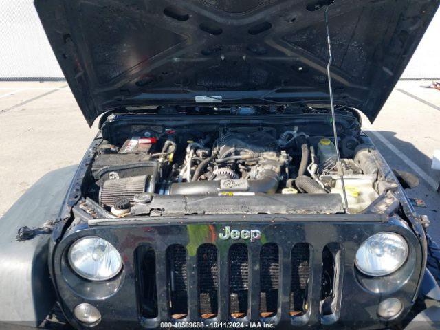 1C4BJWDG9FL641042 Jeep Wrangler Unlimited Sport