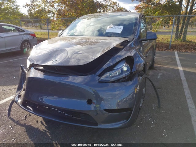 2023 TESLA MODEL Y 7SAYGDEE1PF891960 Photo 1