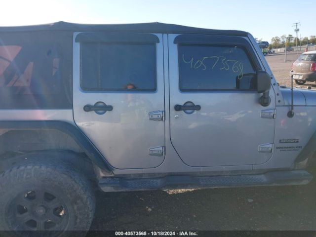 1C4BJWDG7EL320048 Jeep Wrangler Unlimited Sport