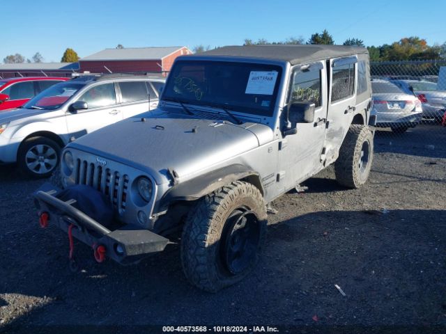 1C4BJWDG7EL320048 Jeep Wrangler Unlimited Sport