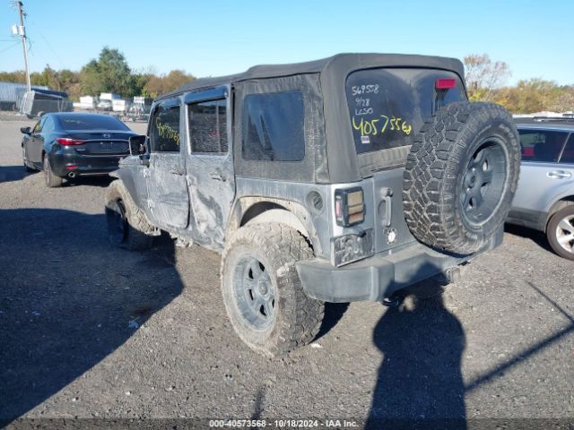 1C4BJWDG7EL320048 Jeep Wrangler Unlimited Sport