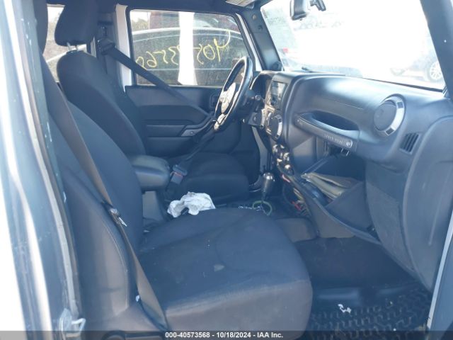 1C4BJWDG7EL320048 Jeep Wrangler Unlimited Sport