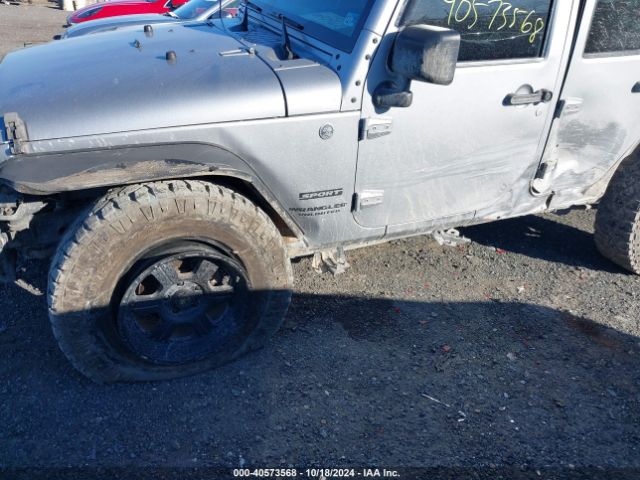 1C4BJWDG7EL320048 Jeep Wrangler Unlimited Sport