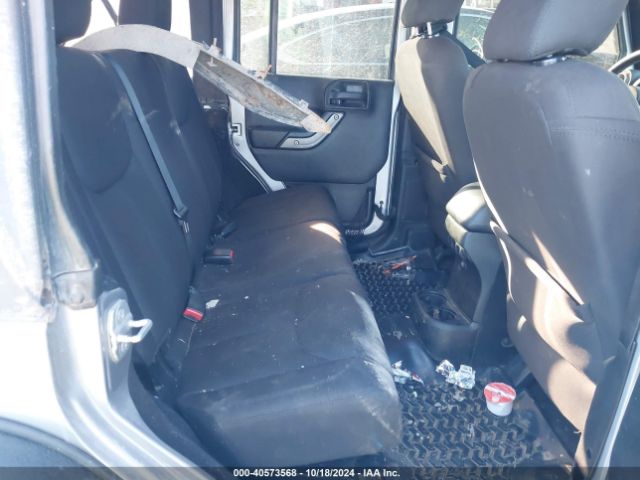 1C4BJWDG7EL320048 Jeep Wrangler Unlimited Sport