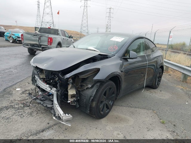 2023 TESLA MODEL Y 7SAYGAEE7PF857018 Photo 1