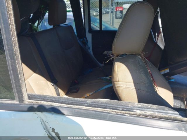 1C4BJWEG4EL310043 Jeep Wrangler Unlimited Sahara
