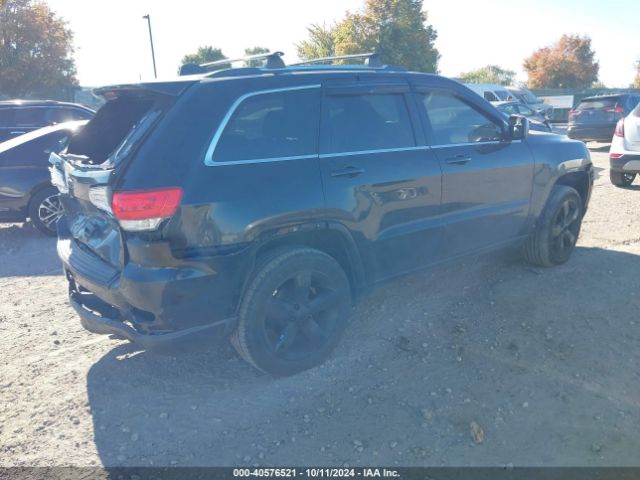 1C4RJFAG5EC242999 Jeep Grand Cherokee Laredo