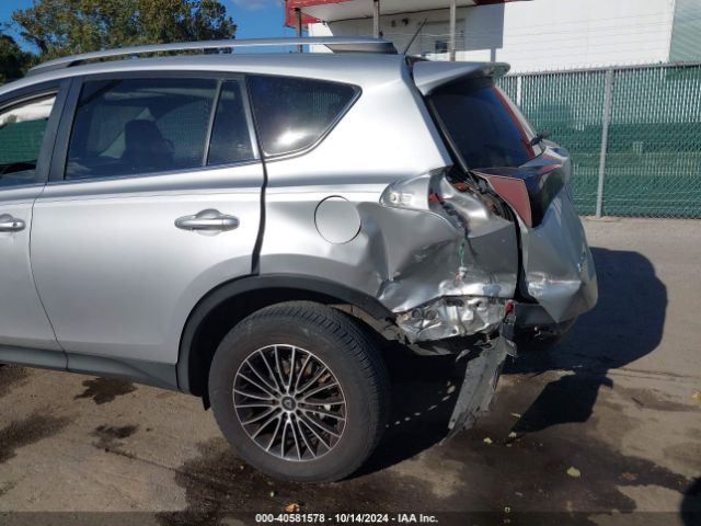 JTMZFREVXFJ035761 Toyota RAV4 LE